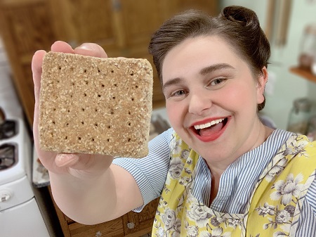 Nancy holding hardtack