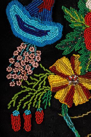 A close-up image of beaded flowers from a Métis octopus bag