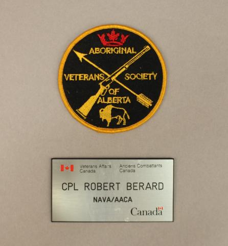 The beret, nametag, and badge worn by Robert Berard at the ceremonies for the 50th Anniversary of the Liberation of the Netherlands.